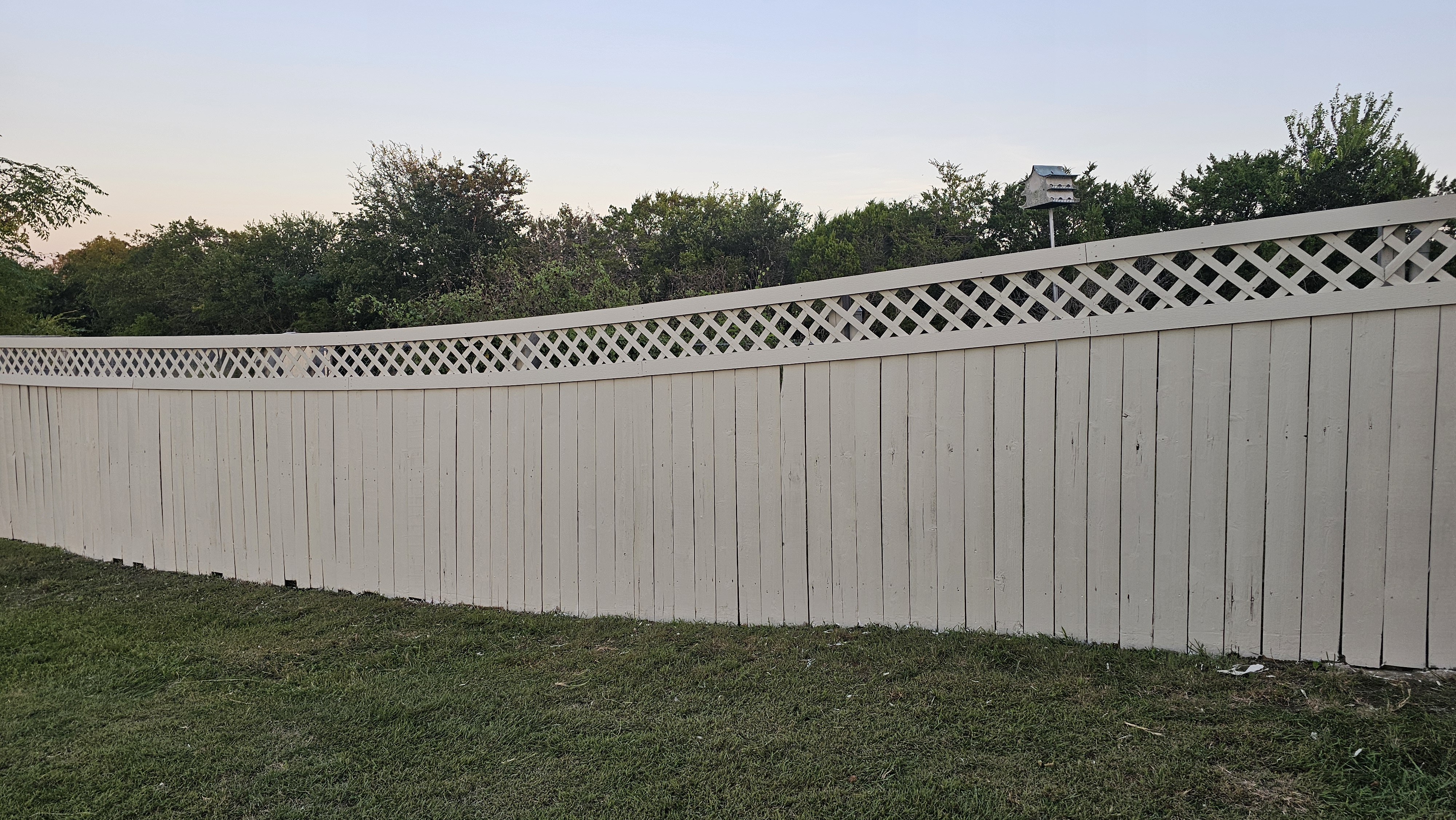 Freshly painted fence and exterior