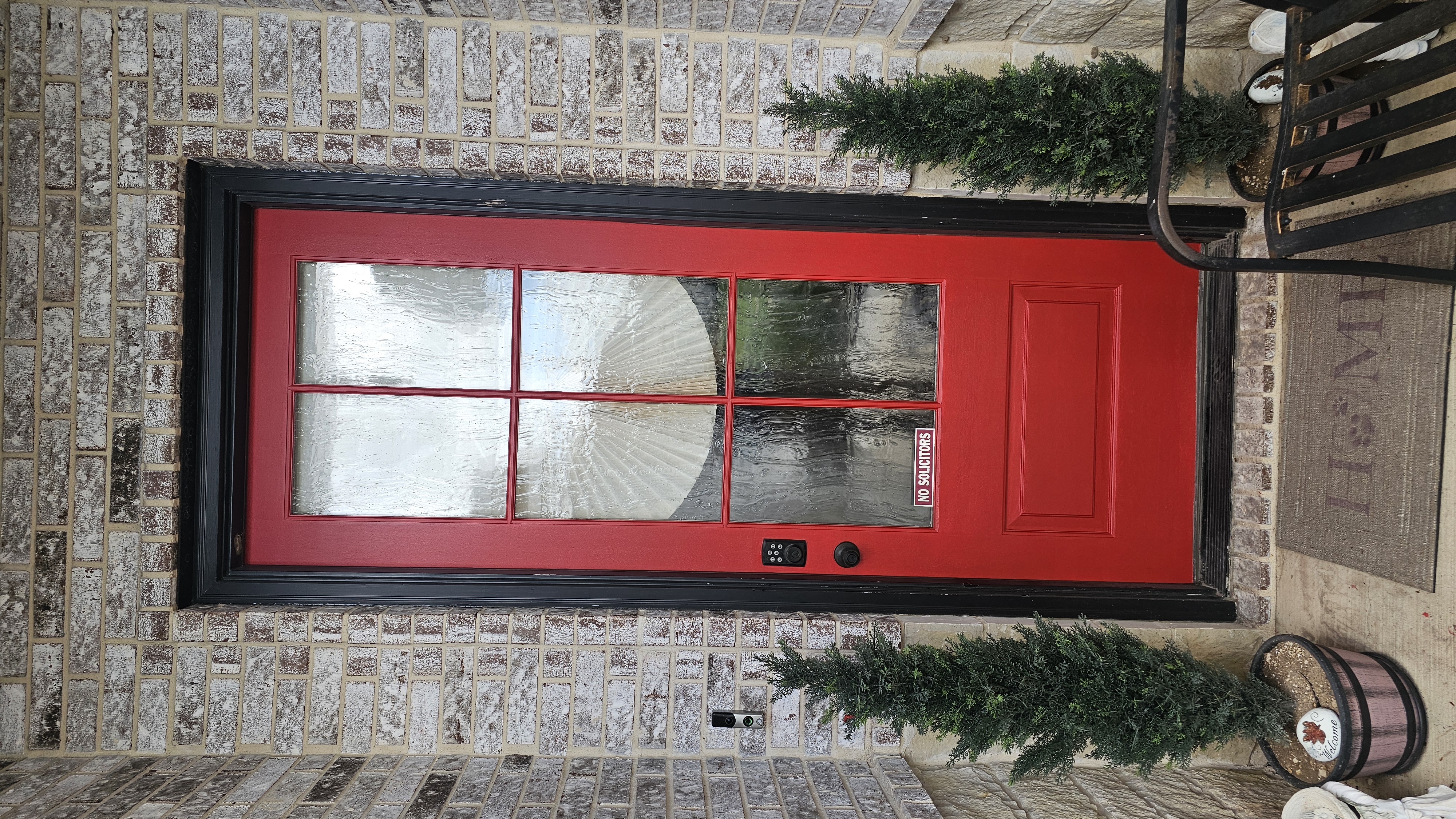 Bright red door after painting project